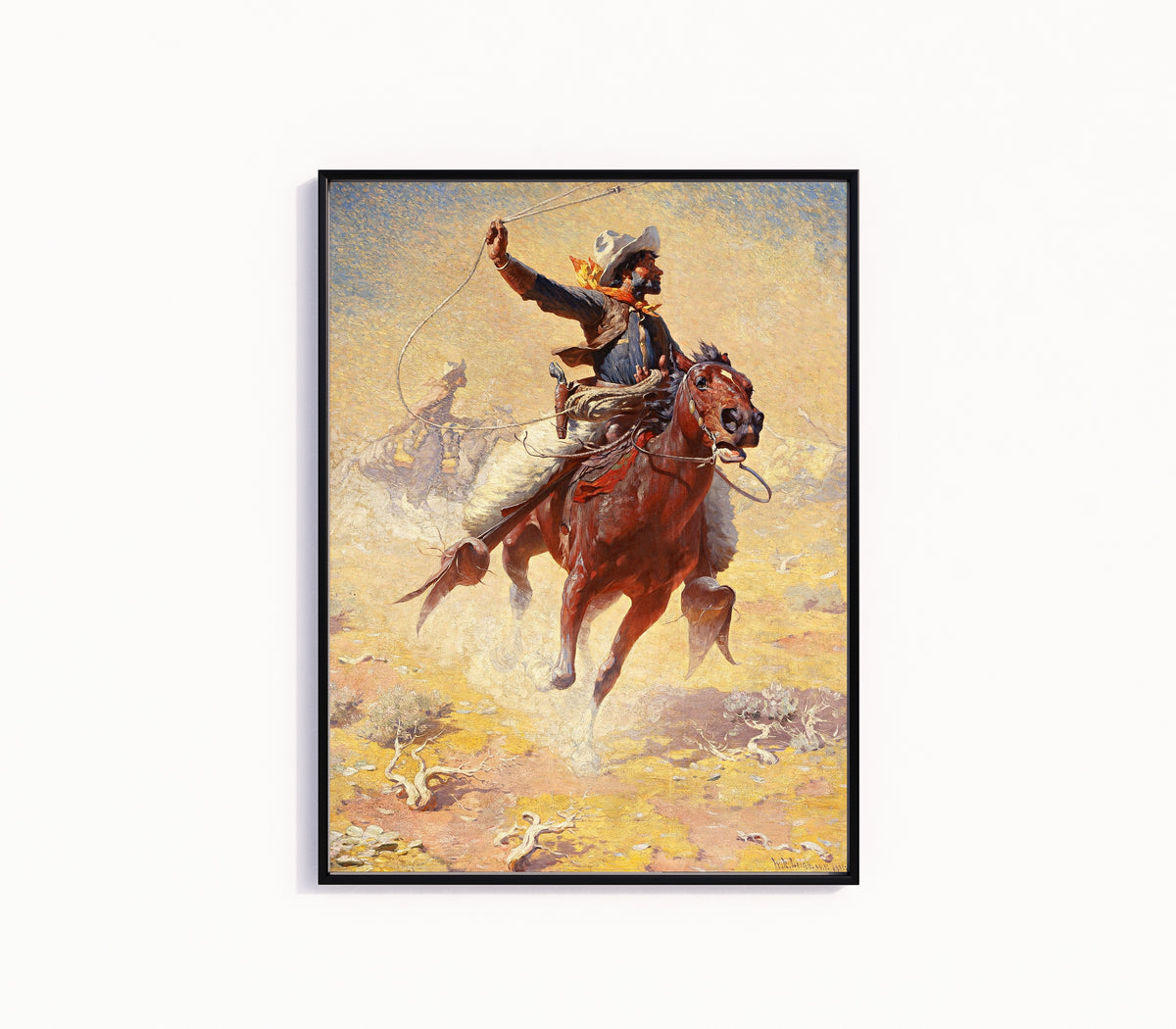 Framed art print of The Roping by William Robinson Leigh, in a slim black frame on a plain white wall
