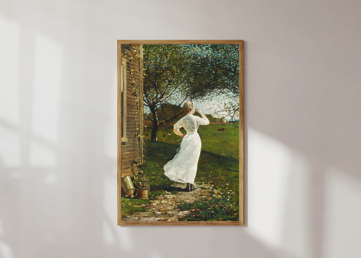 Framed art print of The Dinner Horn by Winslow Homer, in a light wood frame on a sunlit white wall